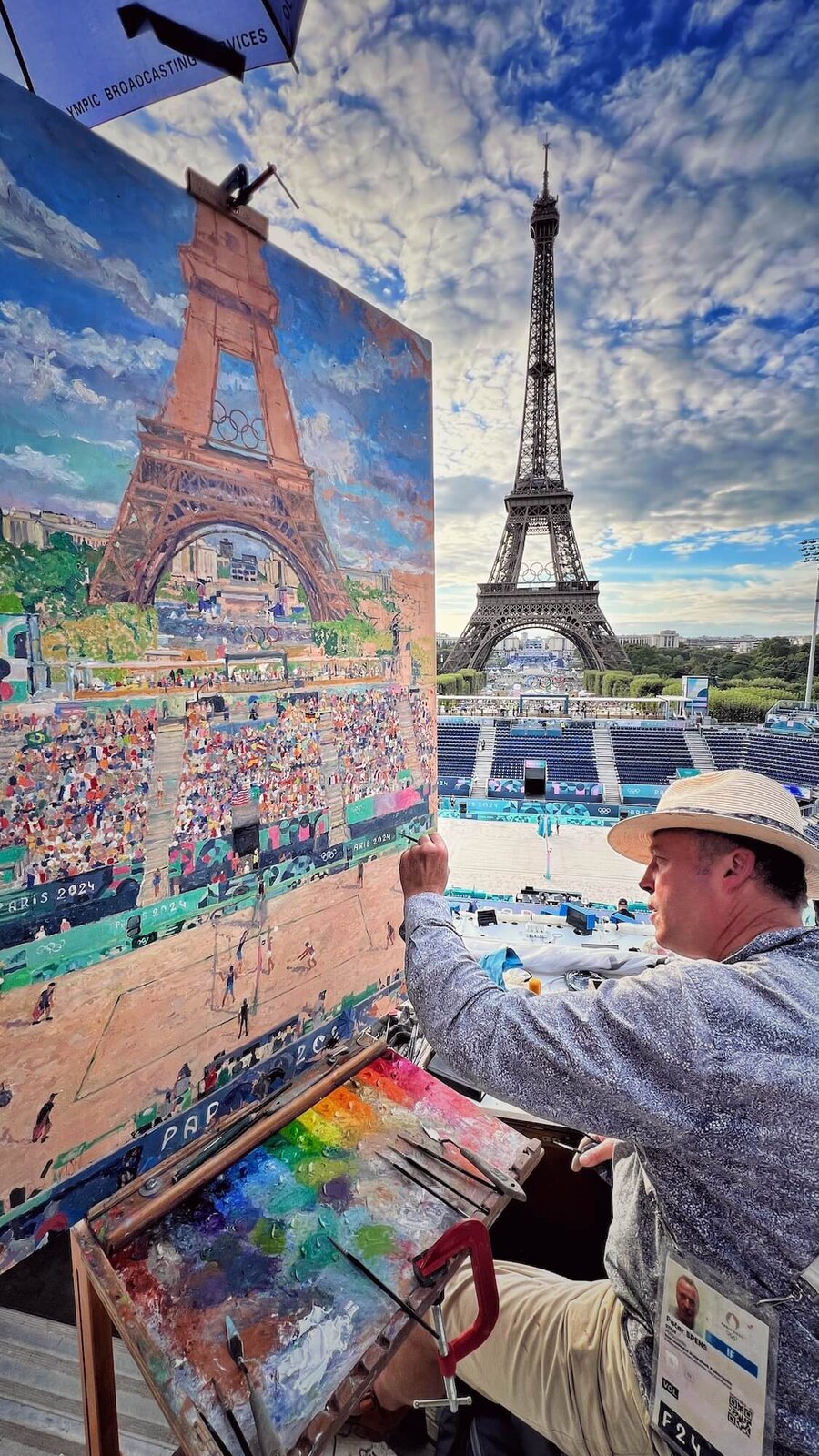 Peter Spens painting beach volleyball at the Eiffel Tower Stadium, Paris Olympics 2024