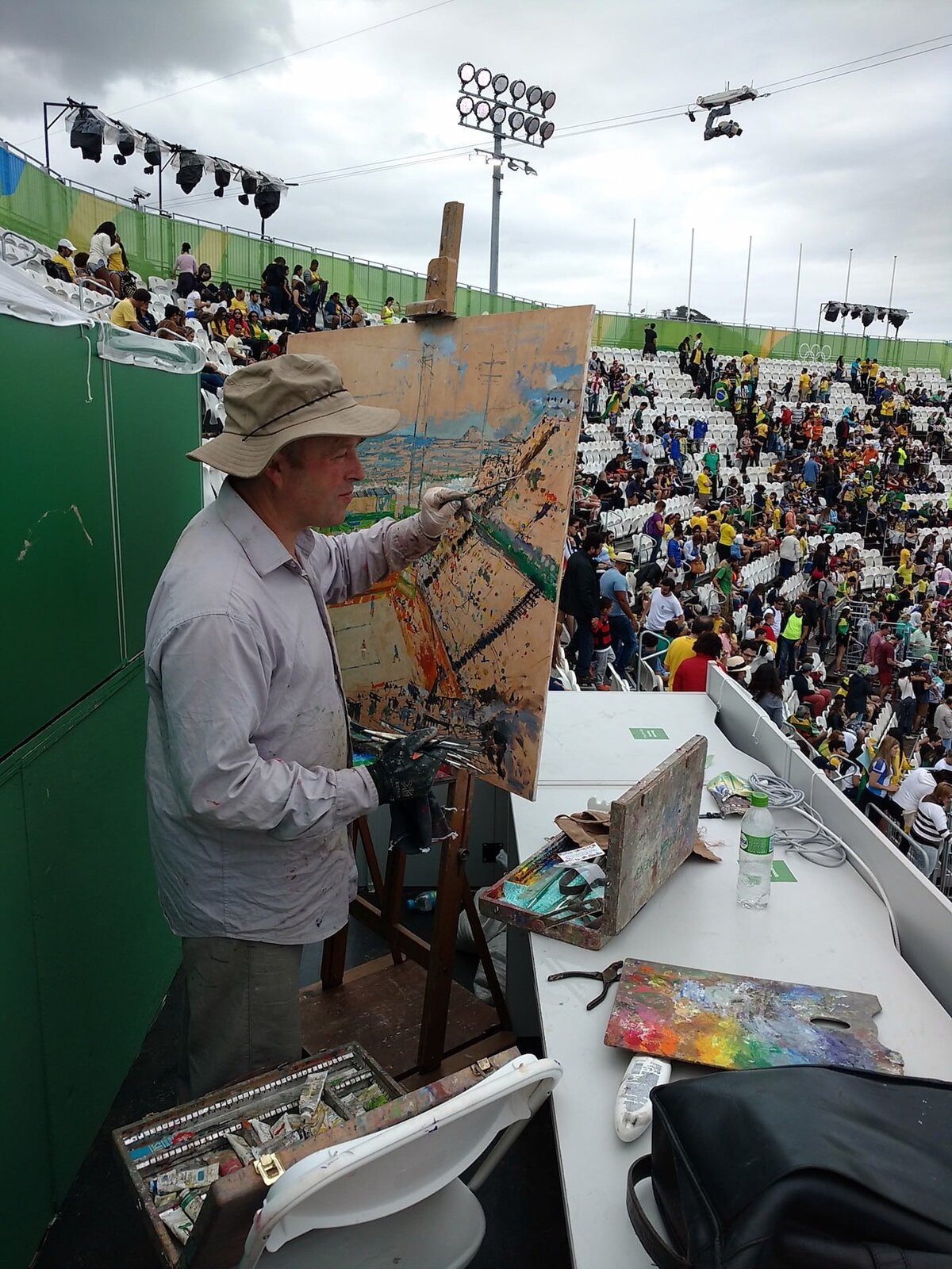 Peter Spens painting beach volleyball at the Rio Olympics, 2016